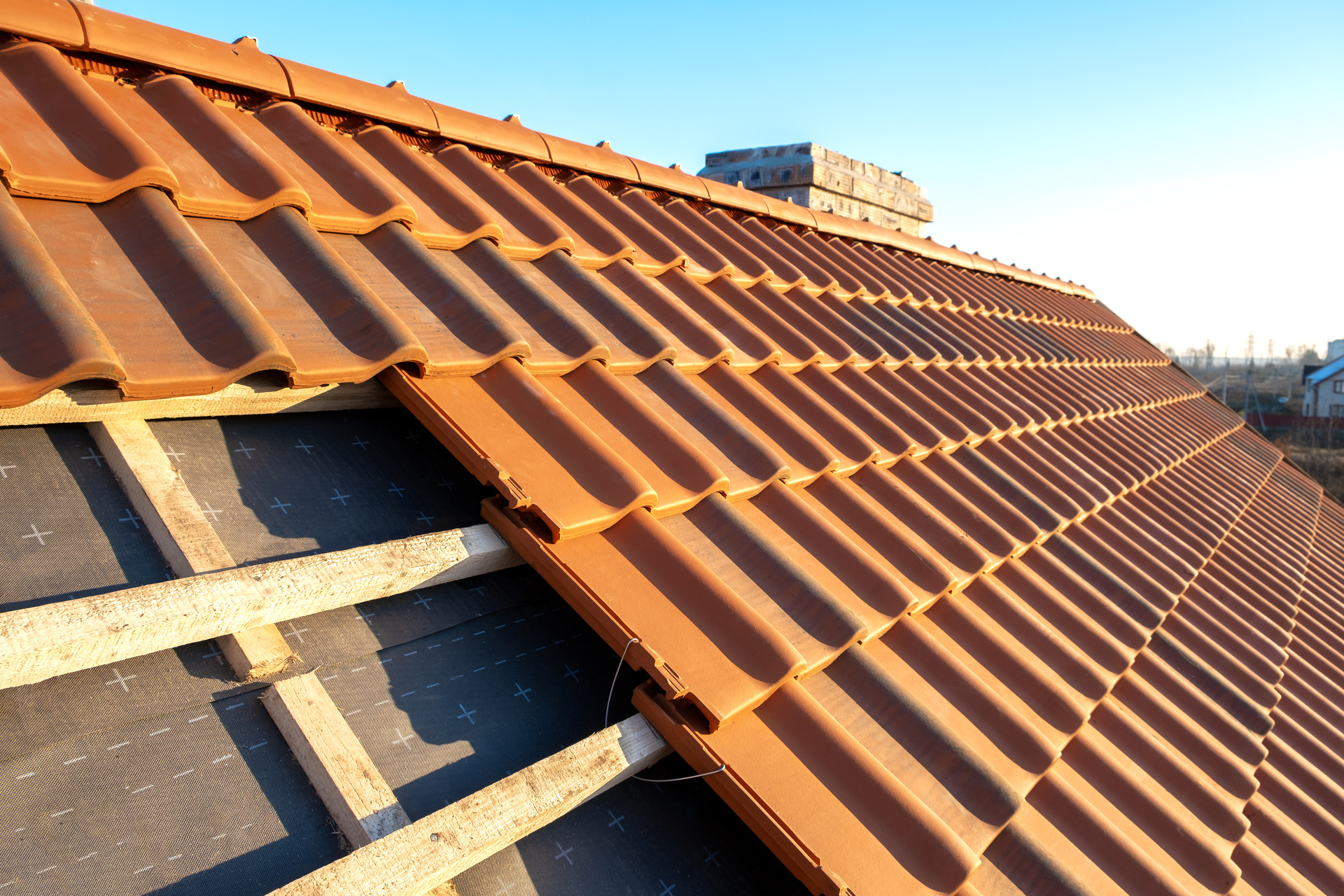 Cooling a Building Naturally: How Reflective Roofing Systems Reduce Heat Gain